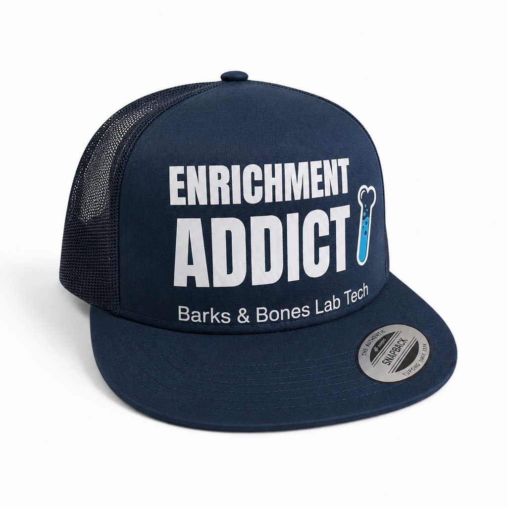 Navy blue cap with 'Enrichment Addict' text on a white background